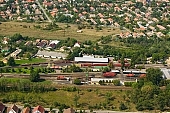 Szentes, Szentes city, Csongrad county, engine, engines, rail, tracks, station, railway station, Hungary, depot, train, trains, marshalling-yard, transfer station, shunting yard, switchyard, transportation, traveling, freight train, goods train, railway carriage, car, carriage, coach, vehicle of transport, platform, rails, track, offset, start, setout, arrival, waiting hall, waiting room, waiting, deck, outskirts, residential area, green, tree, trees, water tower, air photograph, air photo, air photos, aerials, aerial, birds eye view, tower blocks, block of flat, block of flats, tower block, high, concrete, town, city, building estate, faubourg, house, houses, line of houses, street, streets, building, buildings, park, garden, environment, ambience, neighbor, neighborhood, everyday life, at home, countryside, aldermanry, plan, air, square, plot, building operations, development, gardens, rooftop, beauty, beautiful, pretty, white, blue, brown, yellow, flat, gray, of birds eye view, regular, CD 0029, Kiss Lszl, Lszl Kiss