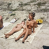 naturist, young, young naturists, young nudist, dame, lady, naturist woman, sand, naturist fellowship, nudist band, nudist, naturist man, nudist women, nudist man, naturist girl, naturist family, naturist couple, sun, sunlight, sunbathing, recreation, relaxation, repose, rest, disengagement, distraction, resource, nature, summer, holidays, fry, swelter, health, saunter, bathe, bathing, as brown as a berry, happy, joyful, joyfully, glad, laughing, laugh, entertainment, getting acquainted, familiar, domesticity, near nature, beach, waterfront, lake, lake side, field naturist, game, Polish, Poland, Kryspinow, 1989, CD 0059