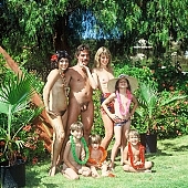 naked, stripped, young naturists, nudism, to sun oneself, to sun, to sunbathe, naturism, freikrperkultur, naturist, photograph, taking photographs, family, naturist family, game, nudist, in a state of nature, in the buff, in the nude, chirpy, sunlight, summer, unclad, beach, naturist beach, nudist beach, grass, woman, man, young nudist, with four children, big family, water, Samagatuma, Laua, Hawaii, CD 0093