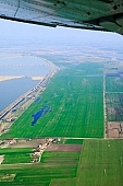 lake, fishpond, water, inland inundation, plow, field, parcel, soil, arable, clod, earth, ploughland, tillage, ground, airphotograph, air photos, aerials, aerial, Hungary, Szeged, white, blue, island, farms, homestead, agriculture, cultivation, grower, grass, green, nature, natural, air, of the air, plan, map, fishery, fishing, farm, sheds, house, houses, road, dirt road, table, wheatfield, Kiss Lszl, Lszl Kiss