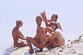 naturist, nudist, naturist woman, naturist man, nudist women, nudist man, naturist girl, naturist family, man, people, group, fellowship, entertainment, bathe, bathing, sun, sunlight, sun-bathing, sunbathing, recreation, relaxation, repose, rest, disengagement, distraction, resource, nature, summer, holidays, fry, swelter, health, as brown as a berry, near nature, beach, waterfront, lake, lake side, field naturist, Polish, Poland, Kryspinow, 1989, CD 0036, Kiss Lszl, Lszl Kiss