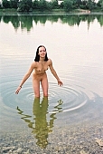 young naturists, taking photographs, naked body, nude body, naturist beach, nudist place, lake, lake side, water, waterfront, grit cell, gravel, gravelly, unclad woman, tattooed, fkk, INF, girl, naked girl, nude, nudity, attitude, pose, posture, naturist girl, in a state of nature, in the buff, in the nude, naturism, unclad, stripped, woman, nudist, nudism, naturist, friend, young, naked, game, recreation, relaxation, repose, rest, sand, camping, beach, Delegyhaza, CD 0095