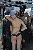 Folsom Street Fair, procession, skin, role, cast, characters, crowd, lookers-on, pride, hiring, purchase, acquisition, gift, group, pair, festival, 30. Sept, plunging neckline, sunday, September, 30, 2007, San Francisco, street-door, people, man, woman, leather, photo, foto, video recording, sunshine, naked, unclothed, world, fetish, tire, tyre, big, large, great, event, warm, gay, camp, CD 0050