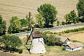 Hodmezovasarhely, windmill, molnar house, miller, site, homestead, farm, Hodmezovasarhely-Erzsebet, Papi windmill, revolving energy, flour, sleet, to grind, to mill, mill, farmhouse, Csongrad county, rye, shingle, art relic, national monument, millstone, grindstone, barley, core, millet, grind, milling, chaff, wheat, gearing, shoot, grain, house, wind, green, garden, recreation, relaxation, repose, rest, silence, quiet, orchard, houses, road, carriageway, bread, fence, tree, trees, air photograph, air photo, air photos, aerials, birds eye view, of birds eye view, building, buildings, everyday life, at home, countryside, plan, air, aerial, square, plot, development, beauty, beautiful, pretty, white, blue, brown, yellow, flat, gray, dirt road, sand, lowland, regular, CD 0029, Kiss L�szl�, L�szl� Kiss