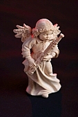 monument, tree, wood-statuette, carving, wood-carving, wood-hew, wood-trim, angel, bassoon, play the bassoon, angel play the bassoon, instrument, musical instrument, Christmas, chiming, celebrate, solemn, holiday, music, song, art, artist, sculptor, 2007, CD 0044, , Kiss L�szl�, L�szl� Kiss
