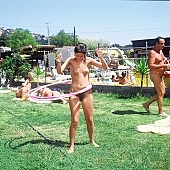 naked, stripped, young naturists, nudism, hula hoop girl, hula hoop, to sun oneself, to sun, to sunbathe, naturism, naturist, family, naturist family, to sport, game, nudist, in a state of nature, in the buff, in the nude, chirpy, sunlight, summer, unclad, beach, naturist beach, nudist beach, woman, man, young nudist, life belt, life saver, bathe, bathing, Samagatuma, Laua, 1982, Hawaii, CD 0092
