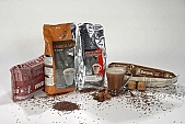 coffee, coffee box, packet, packing, household, drink, dust, chocolate, hazel, hazelnut, nut, walnut, cup, spoon, spoons, metal, metallic, aluminium, shiny, glass, crome, nickel, stainless, bitter, uscious, sweet, balmy, fragrant, redolent, steamy, reeking, blink, gleam, vacuum, packed, instant, gold, silver, gran, granulated, coffee color, drab, brown, milk, white coffee, coffee beans, Kiss László, László Kiss