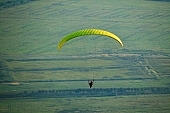 field, paragliding, paratrooper, jumping, parachute, parachutist, hill, hillside, countryside, nature, forest, grass, tree, green, arable, clod, earth, ploughland, tillage, meadow, range, pasture, grazer, parking, near, past, tower, television, bushes, trees, mountain, touch-down, to climb down, landing, to circle round, to lift off, to the left, thermic, yellow, to the right, down, up, Tokaj, clearing, glade, running leap, run up to, heater, headwind, wind, eye, front of, blow, lifting, brave, sport, evening, sunset, sky, lakes, behind we legs, cut-off lands, tables, agriculture, agricultural land, road, critter, haze, steam, vapor, fog, standing, plow, valley, spare-time, leisure, time, cell, flying, base running jump, hardy, Kiss Lszl, Lszl Kiss